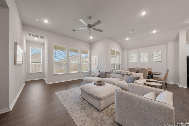 living room with dark hardwood / wood-style floors and ceiling fan