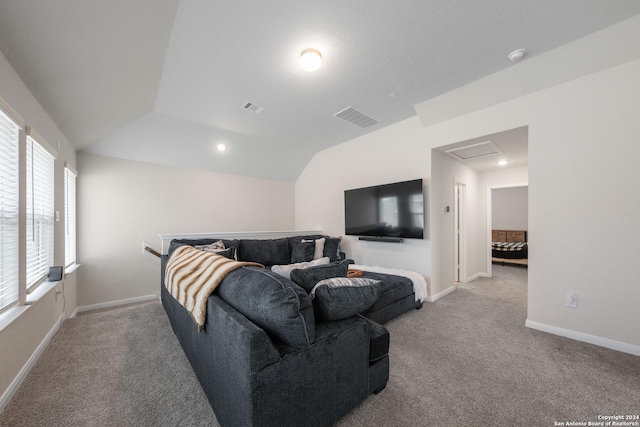 living room featuring light carpet and lofted ceiling