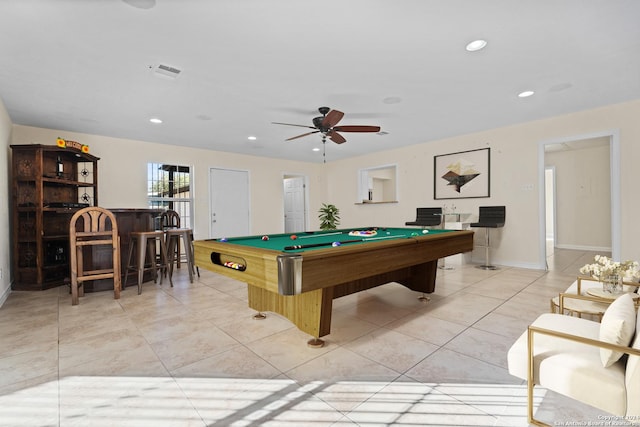 playroom with ceiling fan, light tile patterned floors, pool table, and indoor bar