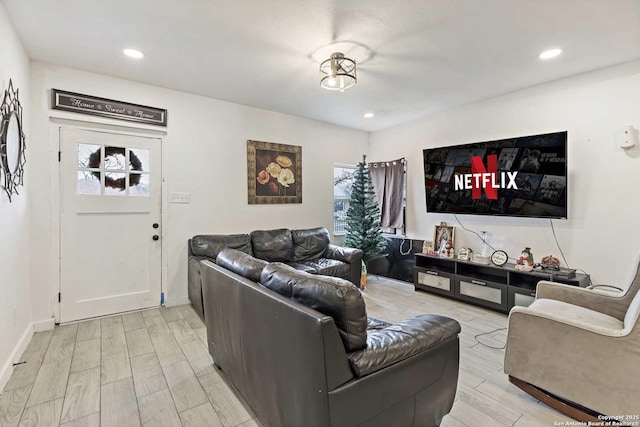 living room with light hardwood / wood-style floors