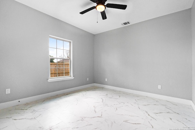 unfurnished room with ceiling fan