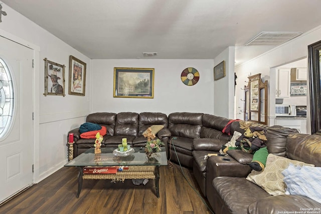 living room featuring dark hardwood / wood-style flooring