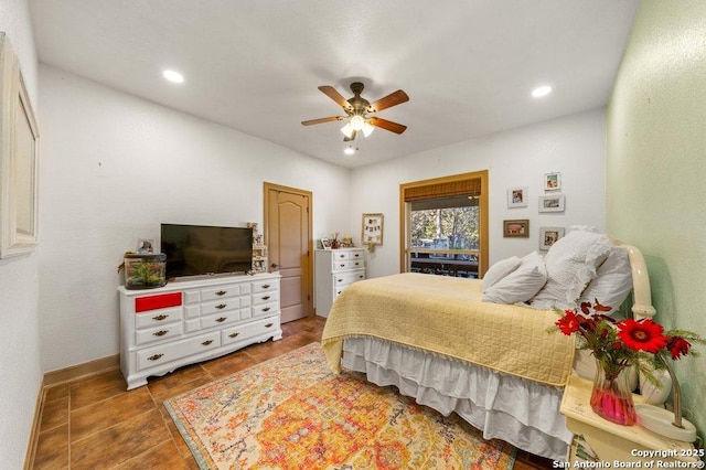 bedroom featuring ceiling fan