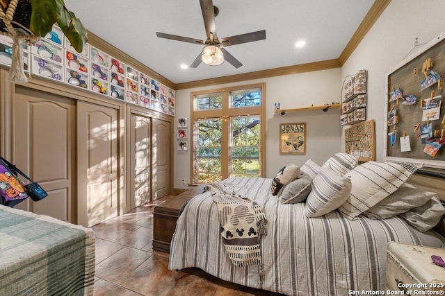 bedroom featuring ceiling fan, crown molding, and dark tile patterned flooring