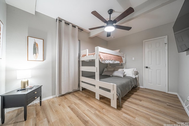 bedroom with light hardwood / wood-style flooring and ceiling fan