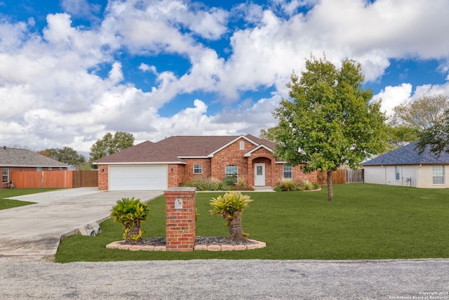 ranch-style home with a front yard and a garage