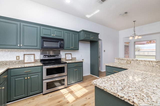 kitchen with pendant lighting, a notable chandelier, double oven range, and light stone counters