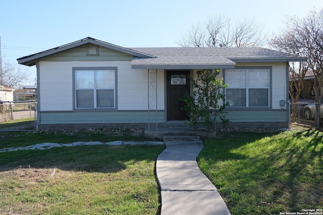 ranch-style house with a front yard