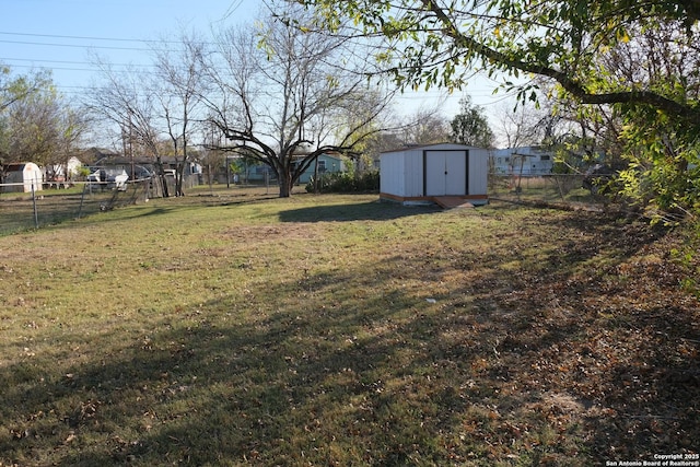 view of yard with a storage shed