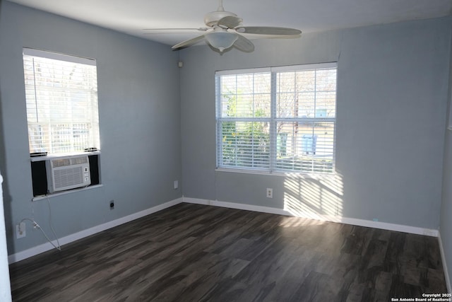 empty room with ceiling fan, cooling unit, and dark hardwood / wood-style flooring