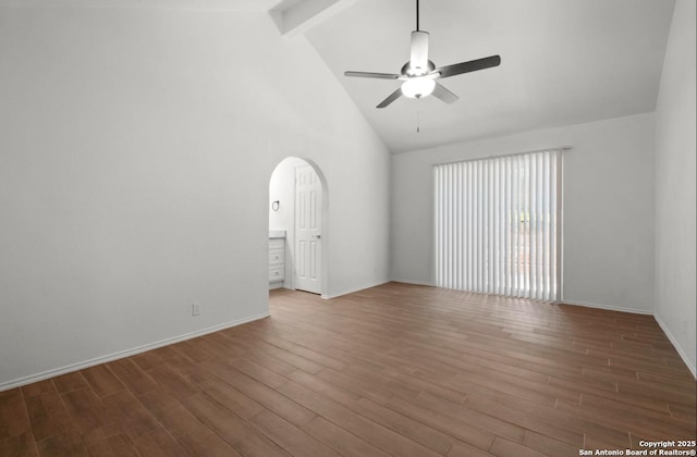 unfurnished room featuring ceiling fan, beam ceiling, dark hardwood / wood-style flooring, and high vaulted ceiling