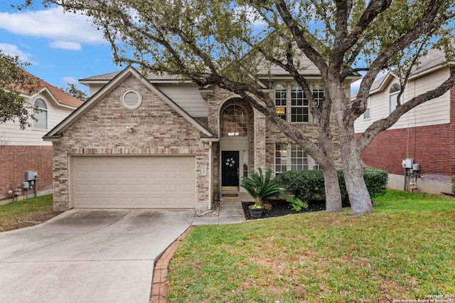 front facade with a garage and a front yard