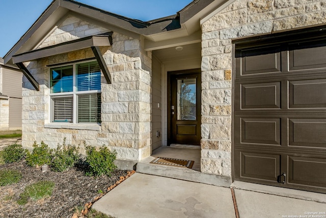 property entrance featuring a garage