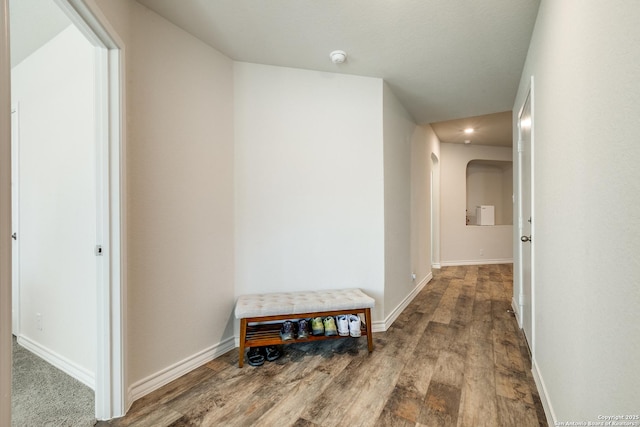 hallway featuring hardwood / wood-style floors