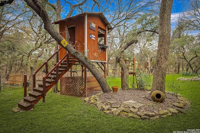 view of jungle gym with a yard