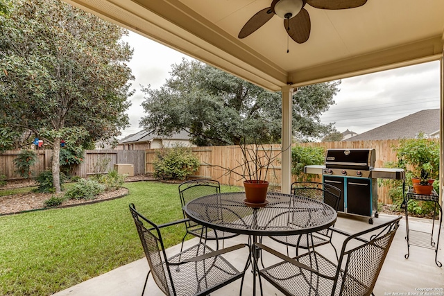 view of patio / terrace with a grill and ceiling fan