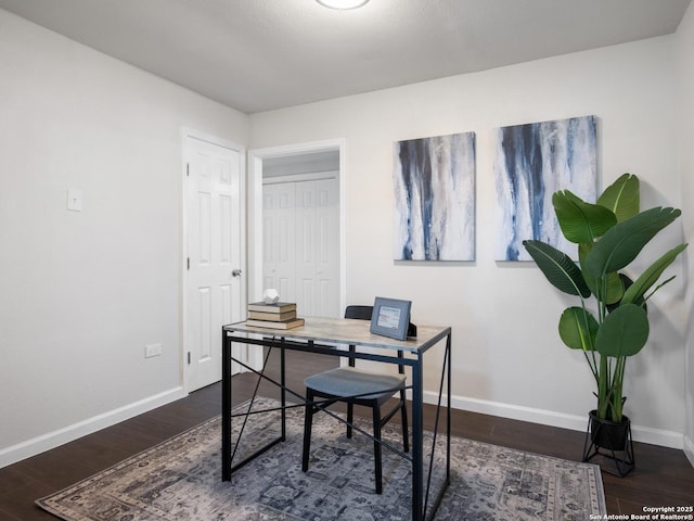 home office featuring dark hardwood / wood-style floors