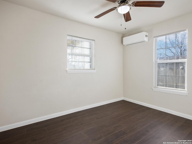 unfurnished room with ceiling fan, dark hardwood / wood-style flooring, and a wall mounted AC