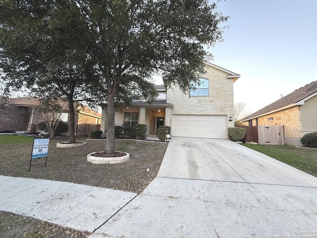 front of property featuring a garage