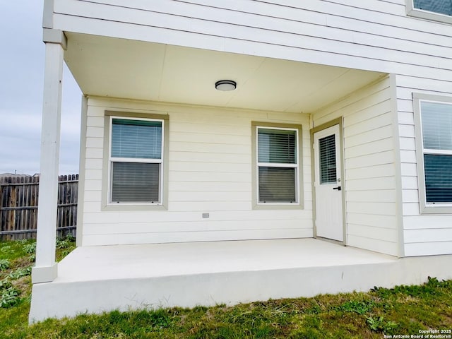 doorway to property featuring a patio area