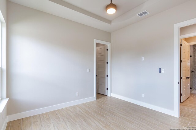 unfurnished room featuring light wood-type flooring