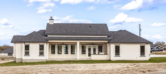 back of property featuring french doors and ceiling fan