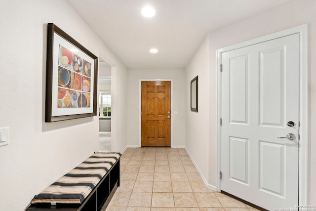 hallway with light tile patterned floors