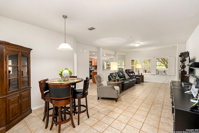 living room featuring light tile patterned flooring