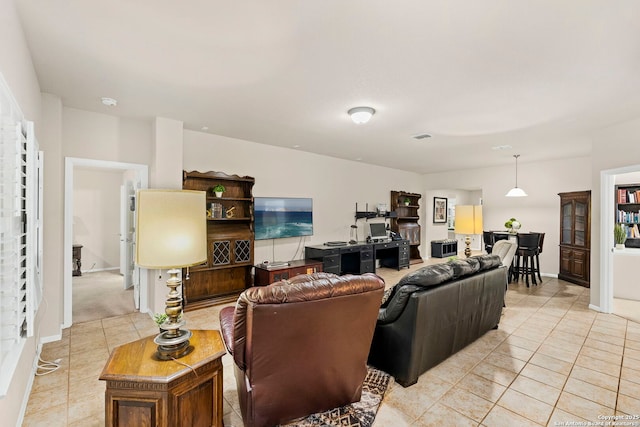 living room with light tile patterned floors