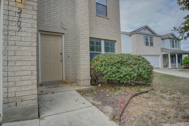 entrance to property featuring a garage