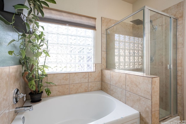 bathroom with independent shower and bath