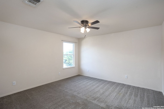 carpeted empty room with ceiling fan