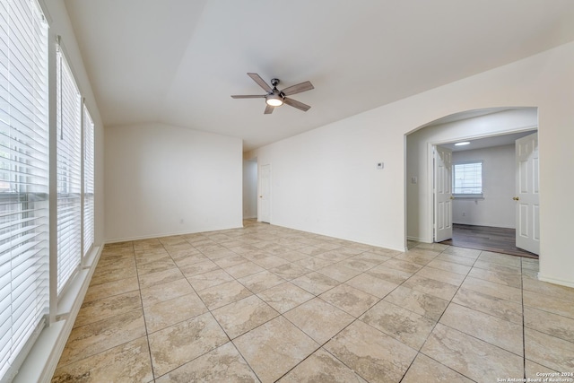 spare room featuring ceiling fan and light tile patterned flooring