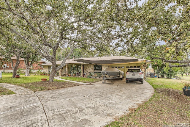 single story home featuring a garage and a front lawn