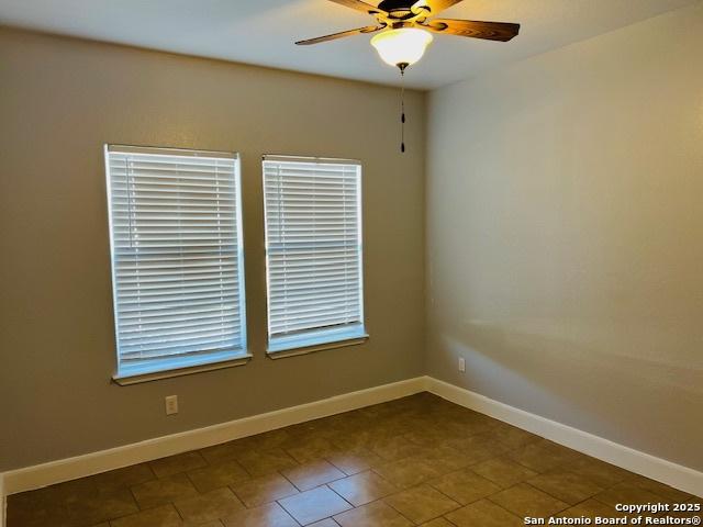 empty room with ceiling fan