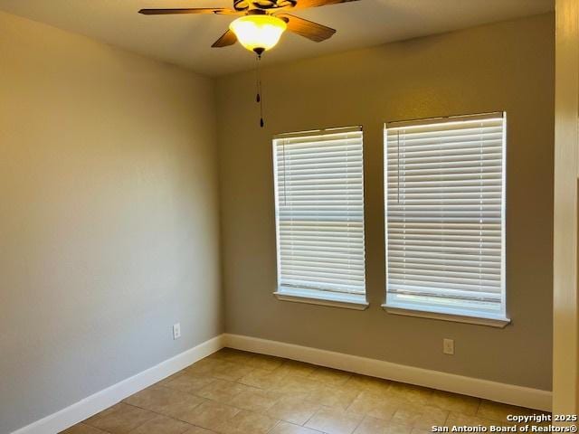 unfurnished room featuring ceiling fan