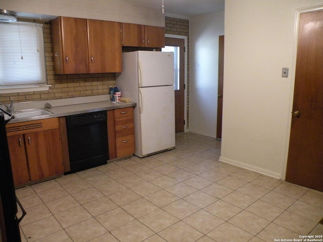 kitchen featuring backsplash, sink, white refrigerator, dishwasher, and light tile patterned flooring