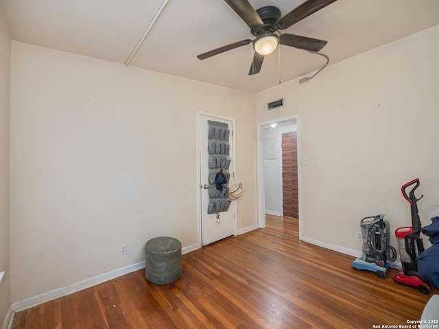 miscellaneous room with hardwood / wood-style flooring and ceiling fan