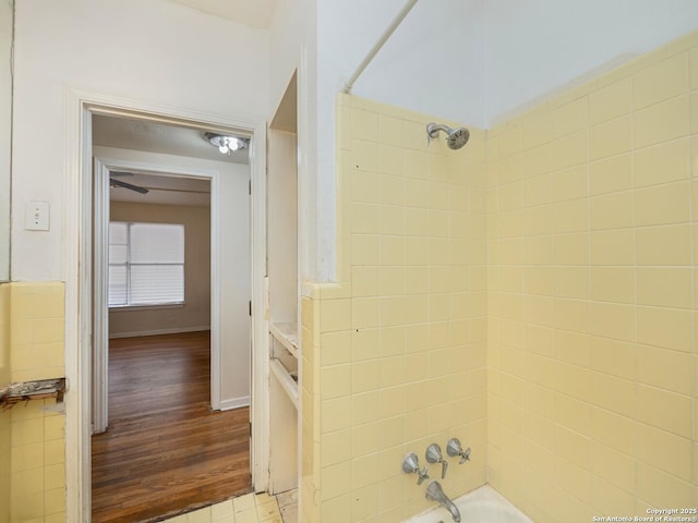 bathroom featuring bathing tub / shower combination