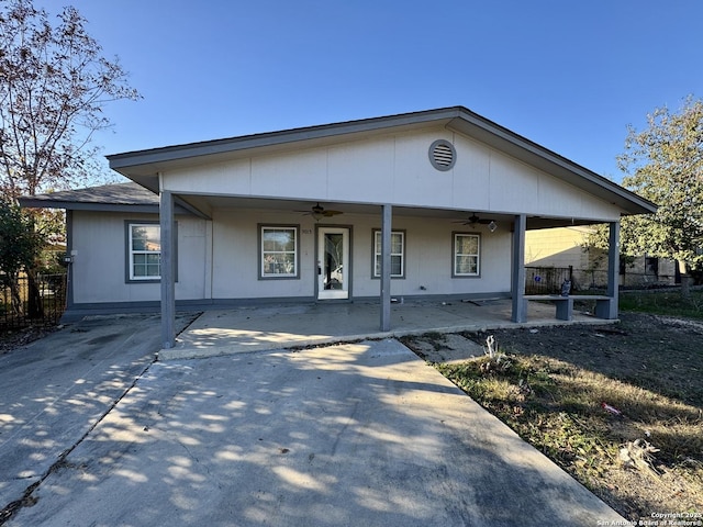 view of front of home with ceiling fan and covered porch