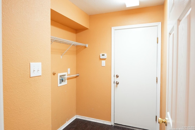 laundry area with washer hookup and dark hardwood / wood-style floors