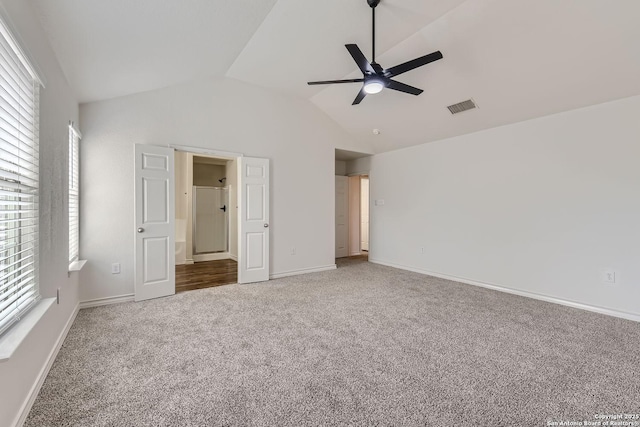 unfurnished bedroom featuring carpet flooring, ceiling fan, and lofted ceiling