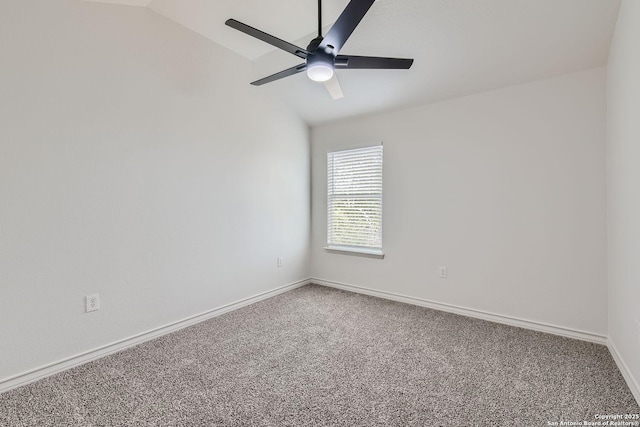 unfurnished room with carpet, vaulted ceiling, and ceiling fan