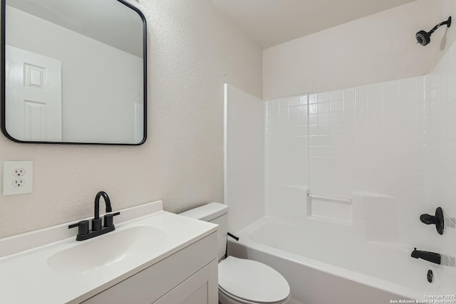 full bathroom with vanity, toilet, and washtub / shower combination