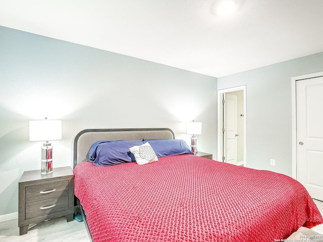 bedroom featuring light hardwood / wood-style floors