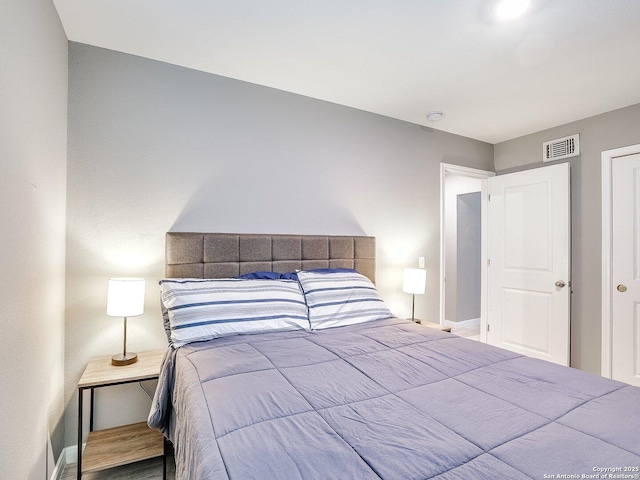 bedroom featuring hardwood / wood-style flooring