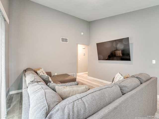 living room with hardwood / wood-style floors