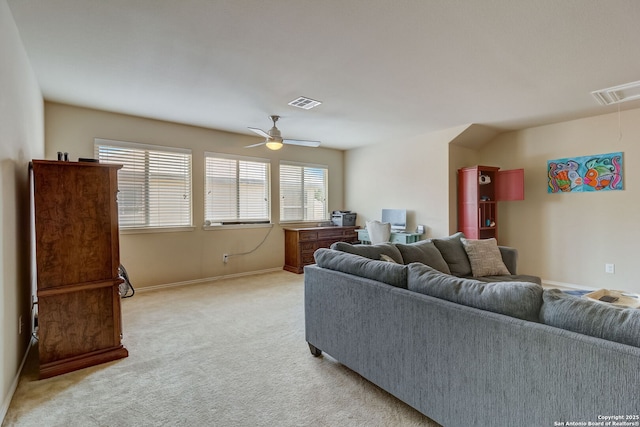 living room with light carpet and ceiling fan