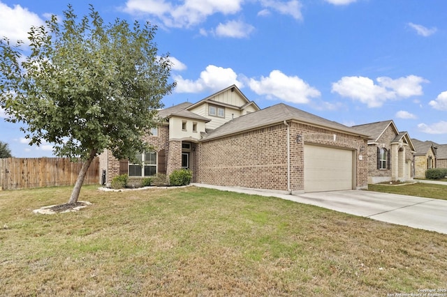 view of front of property featuring a front lawn and a garage