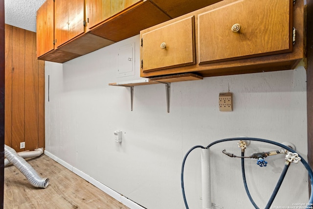 details featuring wood-type flooring and electric panel